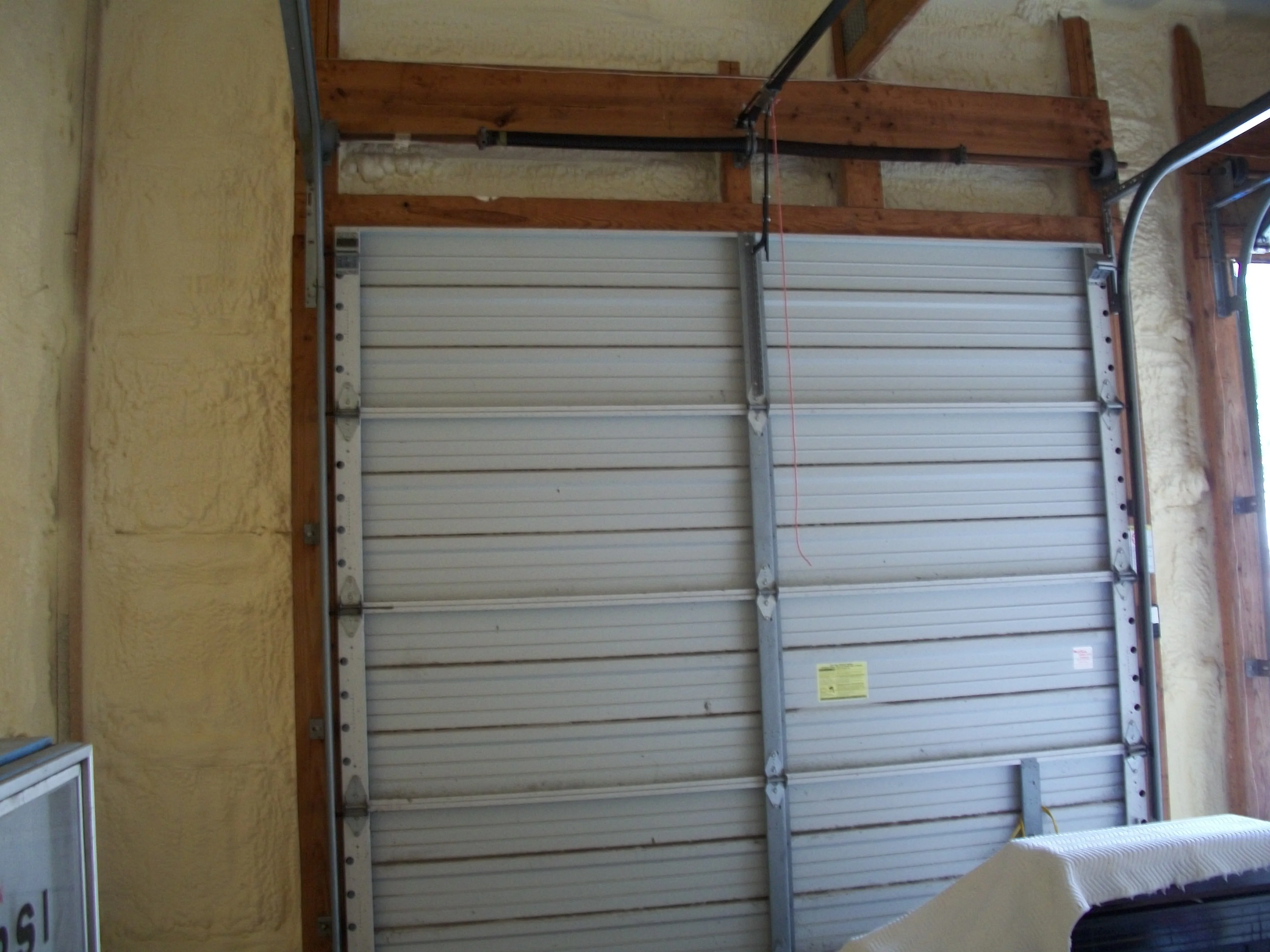 Garage insulation around door frame